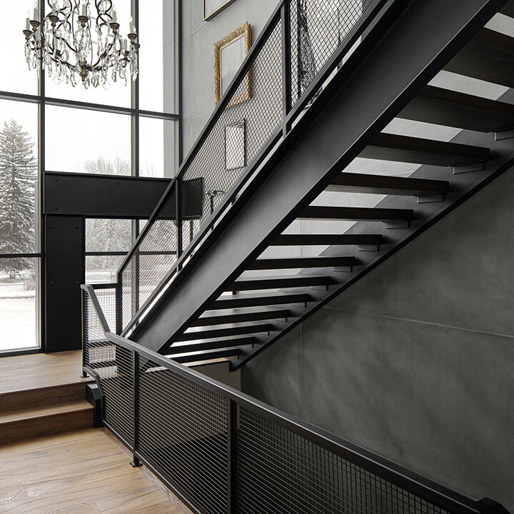 straight floating stair design with mesh panels