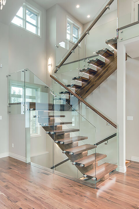 Wood Monostringer Staircase With Structural Glass