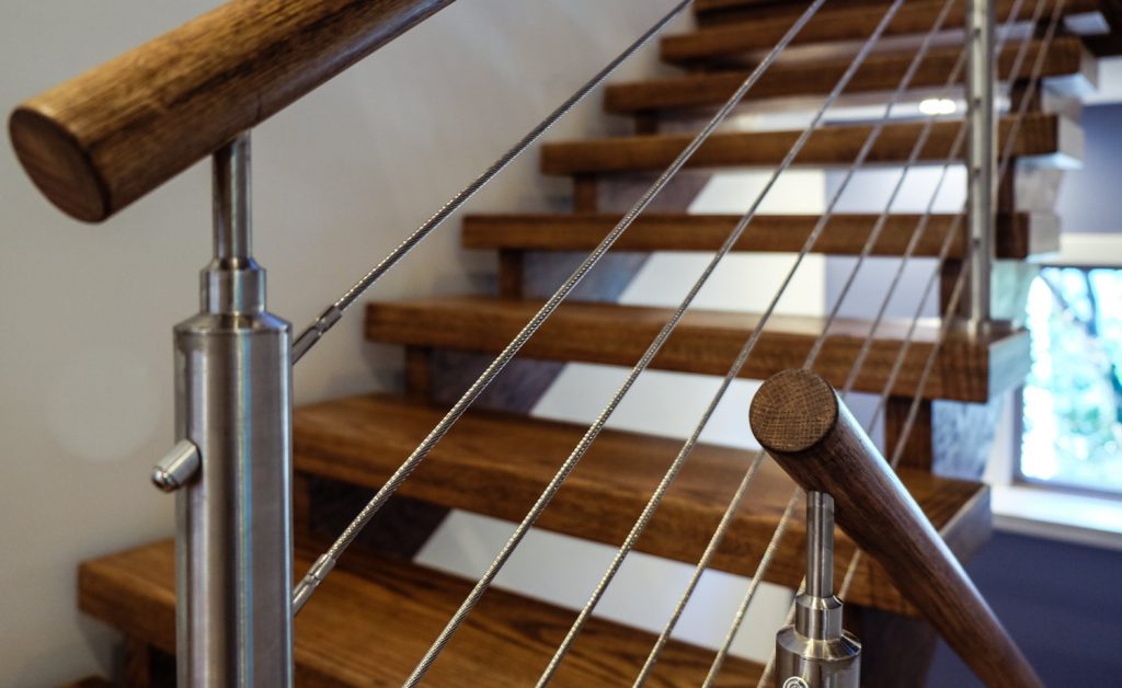cable railing and wood treads staircase remodel