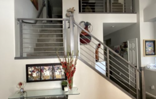 Easy Home Stair Railing Remodel: Install a Striking Metal Railing